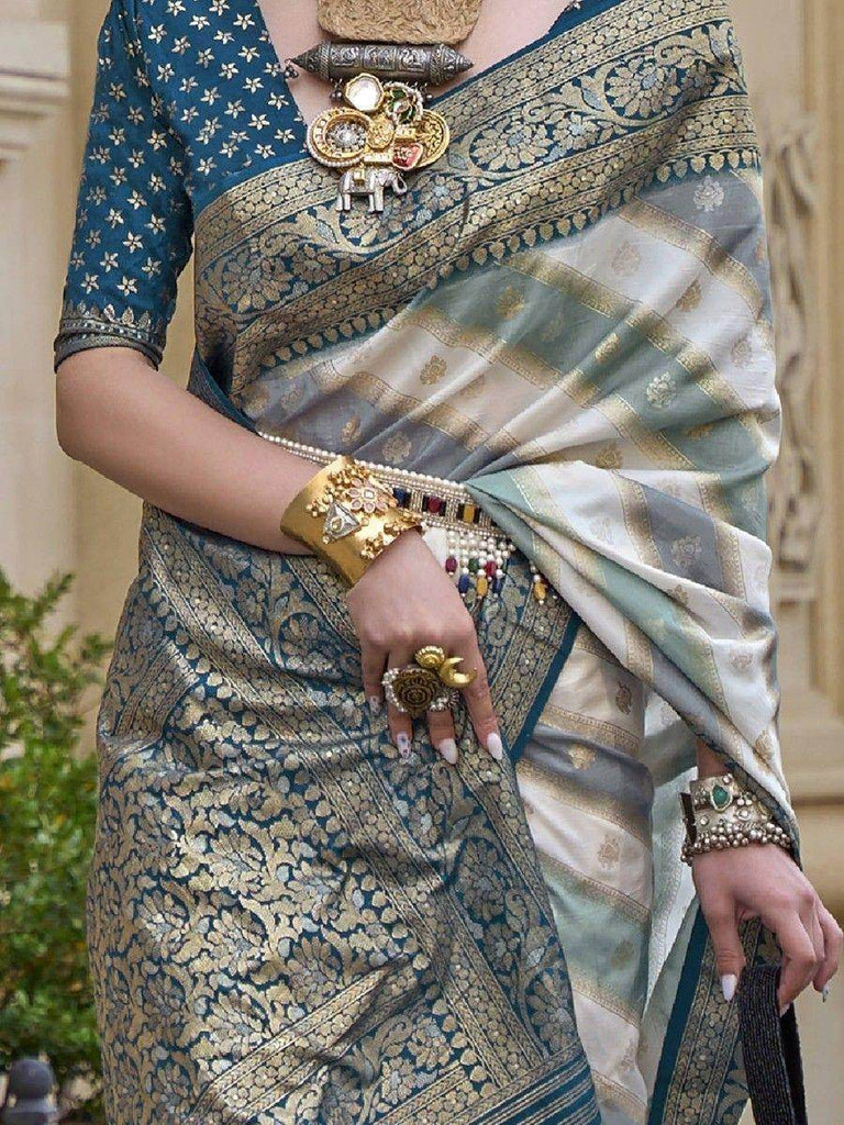 Stunning Teal Blue Zari Weaving Silk Reception Wear Saree With Blouse