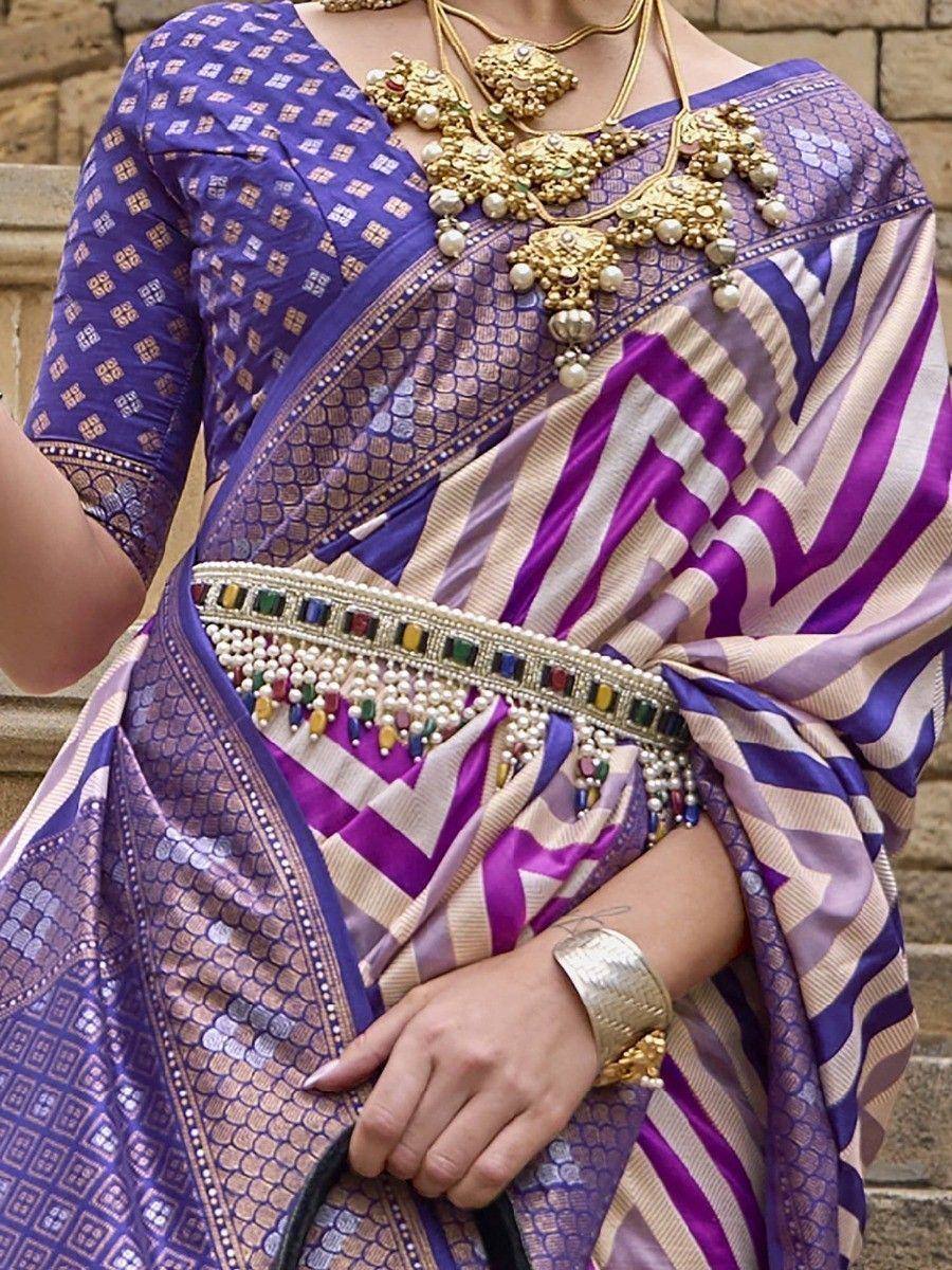 Purple and cream striped saree with gold jewelry, perfect for Indian ethnic occasions