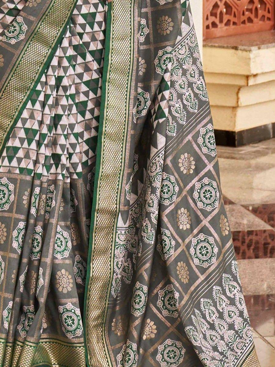 Grey and green printed saree with geometric and floral motifs, perfect for ethnic occasions