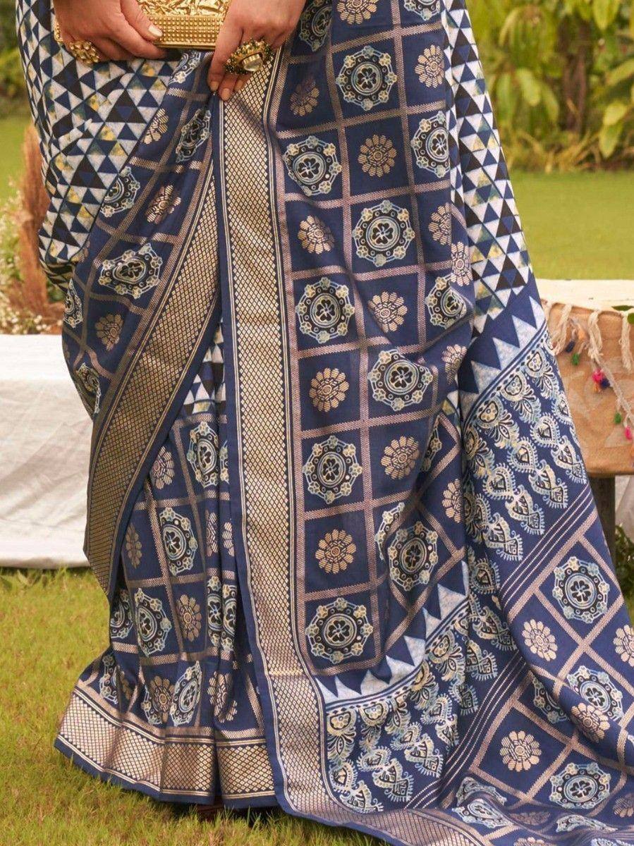 Blue printed saree with gold motifs, ethnic Indian wear, perfect for festive occasions