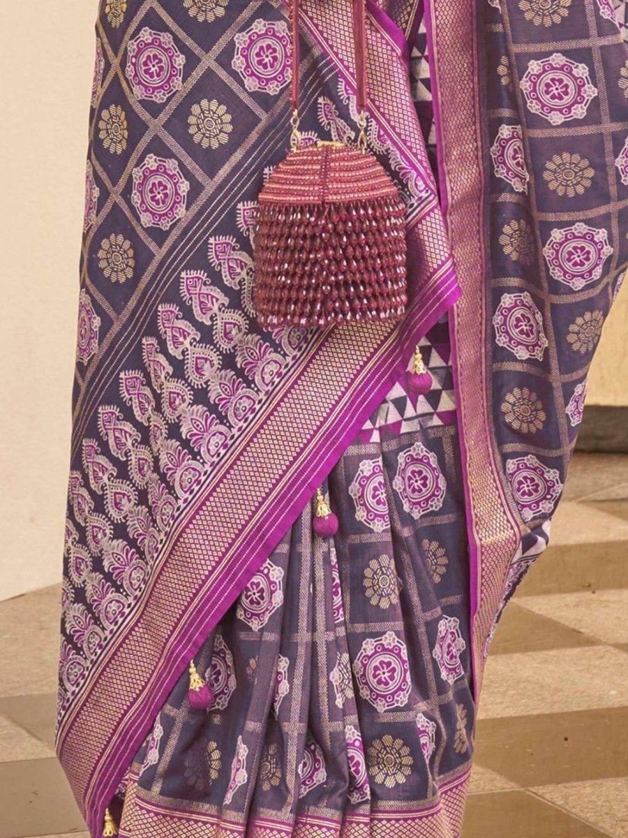 Purple and gold printed saree with beaded potli bag, ethnic Indian wear