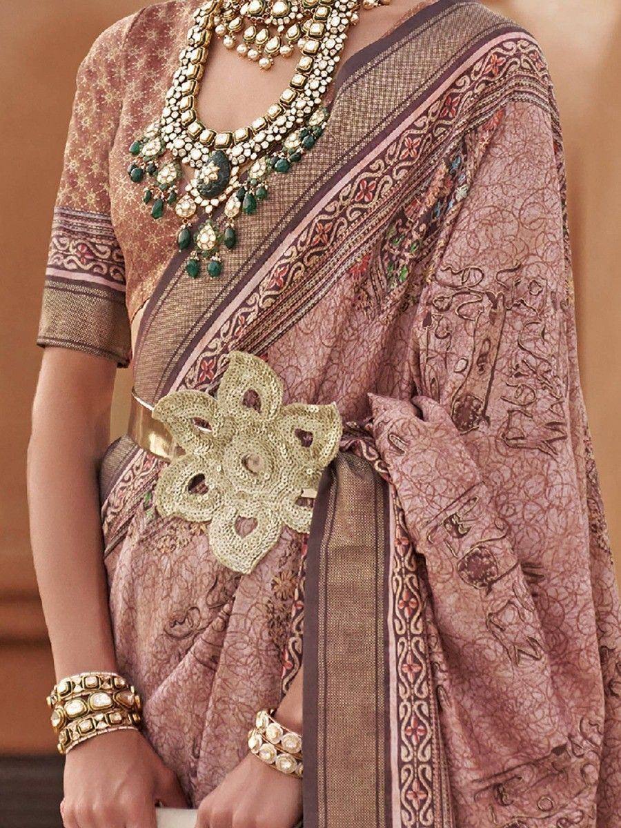 Elegant Indian saree with intricate embroidery, gold belt, and traditional jewelry for ethnic wear