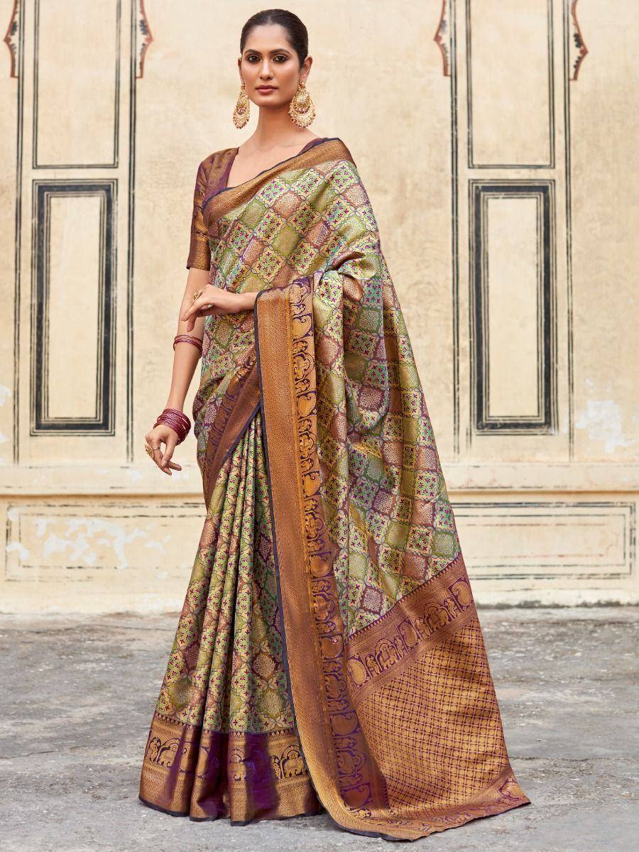 Elegant Indian saree with intricate geometric and elephant motifs, perfect for ethnic occasions