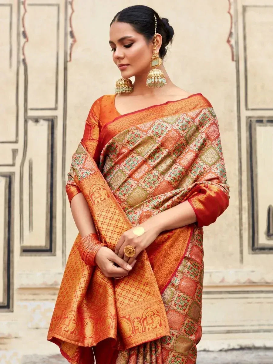 Orange and green designer saree with elephant motifs, traditional Indian ethnic wear