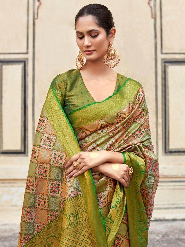 Fascinating Light Green Zari Weaving Silk Traditional Saree With Blouse