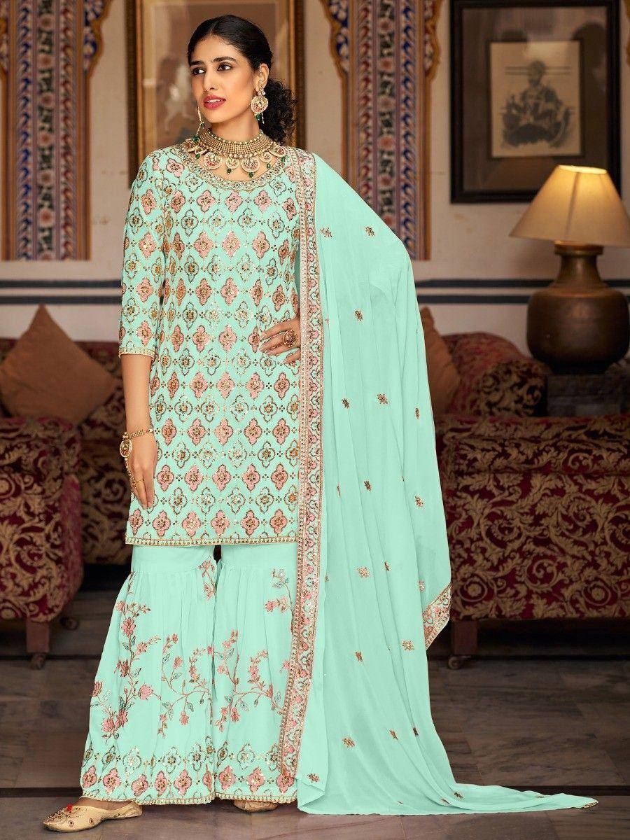 Mint green embroidered salwar kameez with floral patterns and matching dupatta, ideal for Indian ethnic occasions