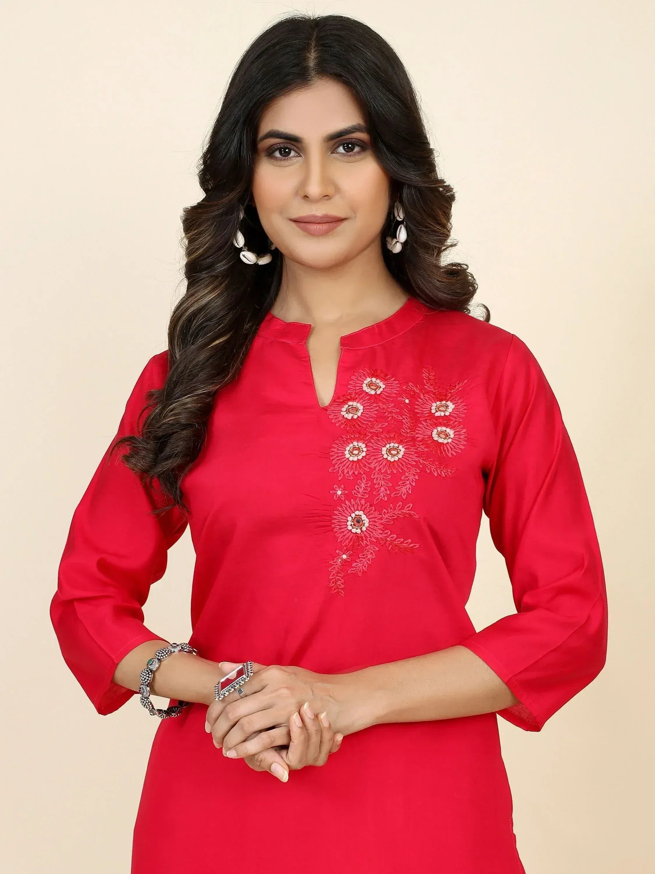 Red ethnic kurti with floral embroidery, perfect for Indian wear and festive occasions.