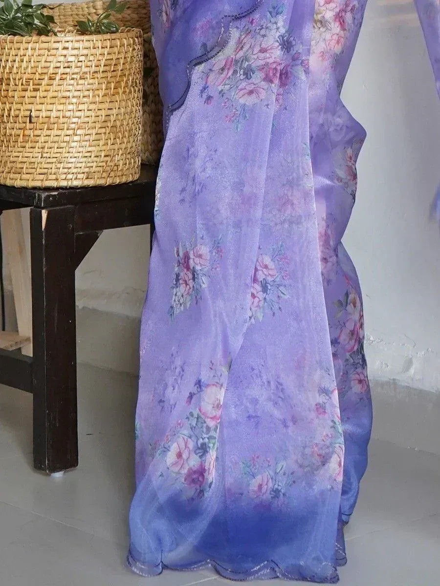 Purple floral ethnic gown with sheer overlay and scalloped hem, perfect for Indian occasions