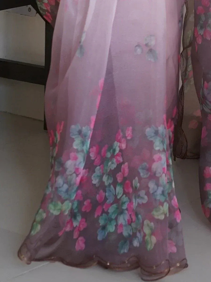 Floral printed ethnic gown with sheer overlay and scalloped hem, perfect for Indian occasions