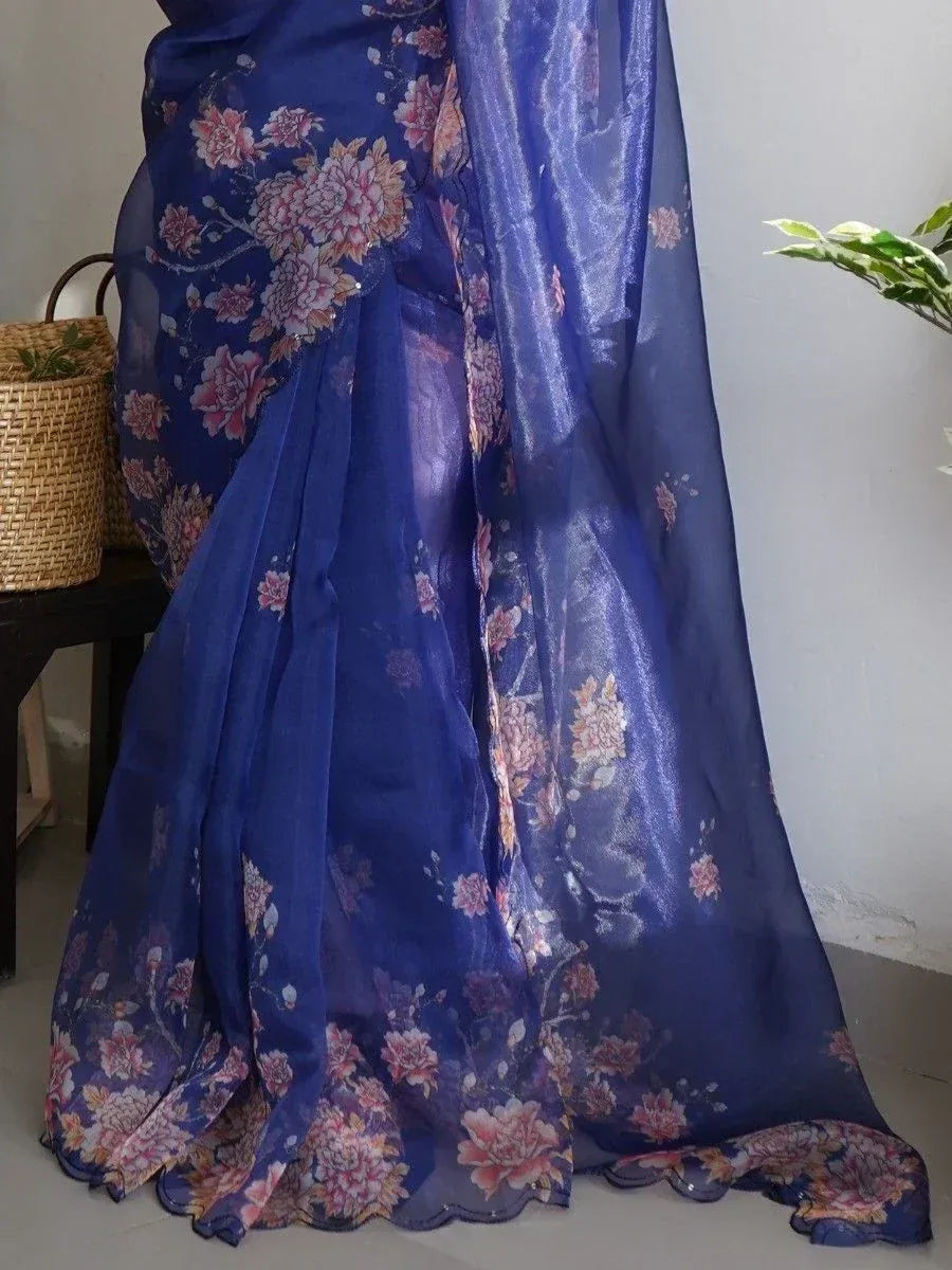 Blue floral printed saree with scalloped hem, elegant Indian ethnic wear for women