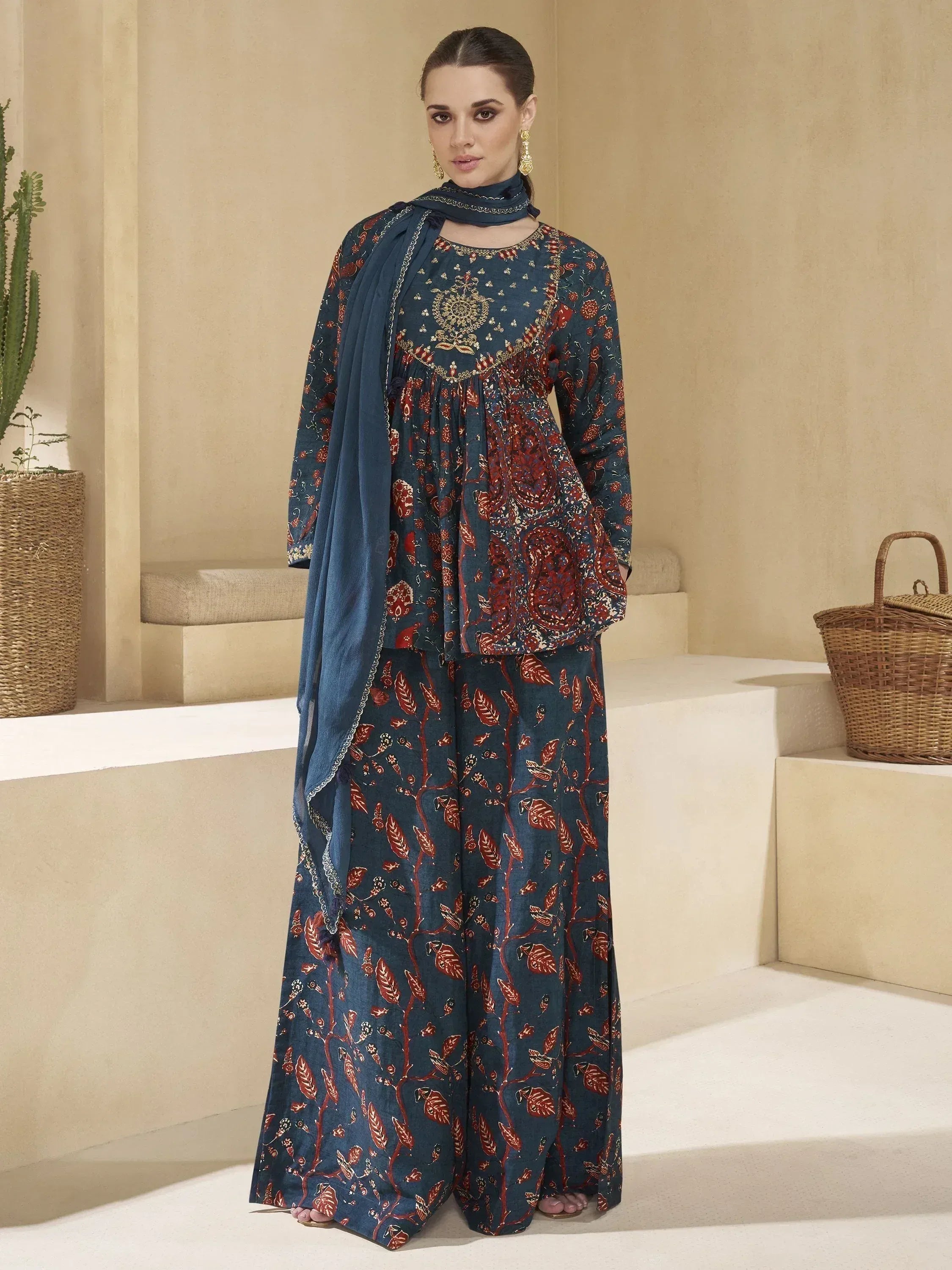 Blue and red printed ethnic salwar kameez with embroidery, paired with matching dupatta for women