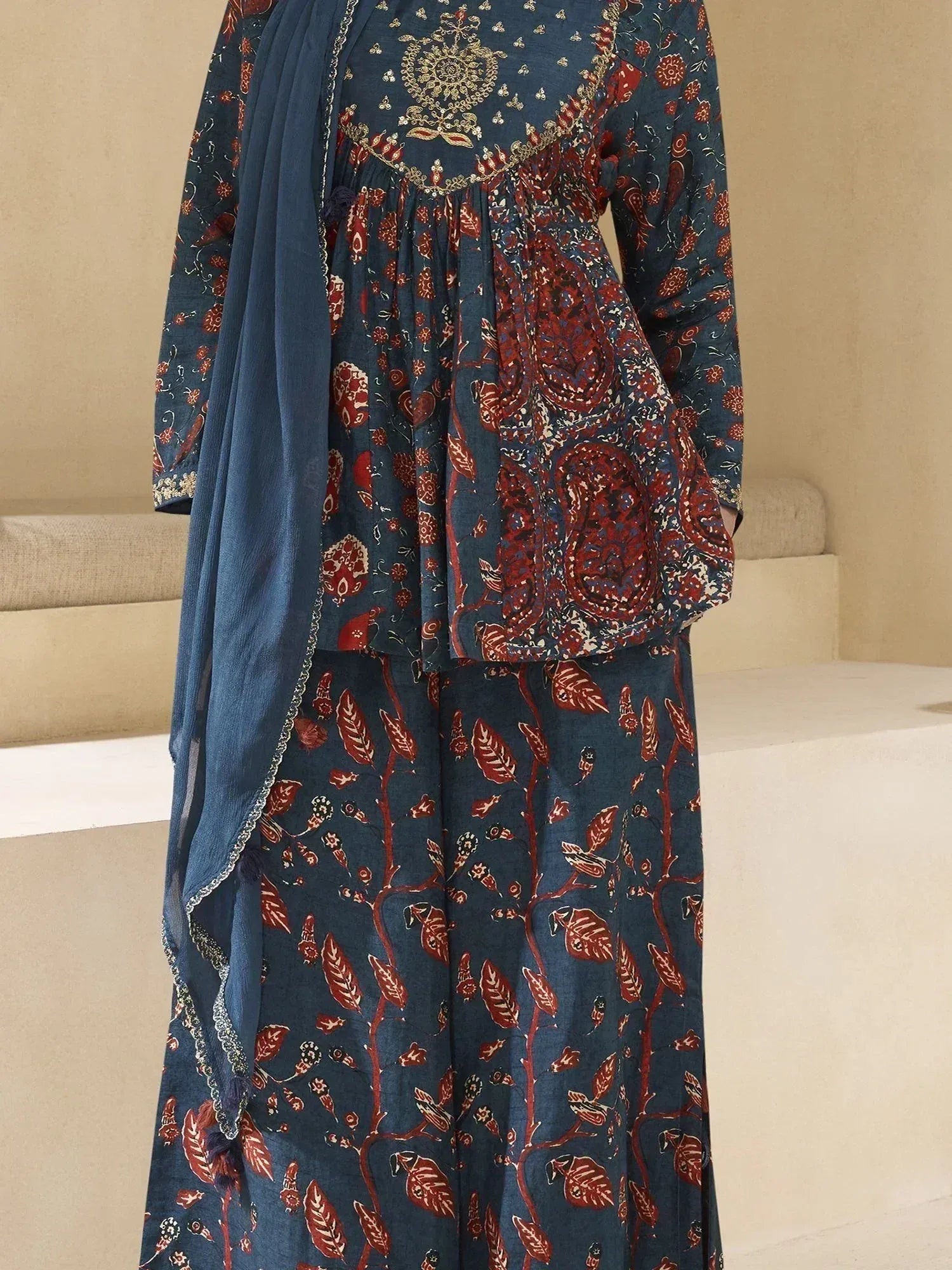 Blue and red printed ethnic salwar kameez with floral embroidery and matching dupatta
