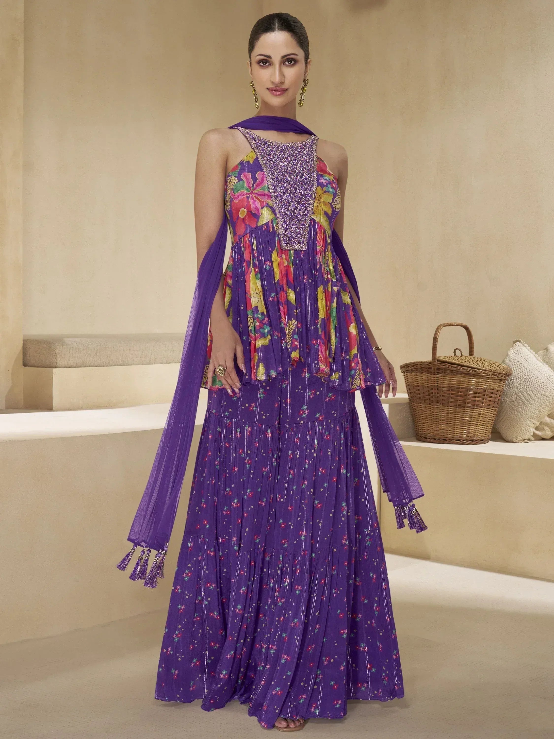 Purple floral print ethnic gown with embroidered neckline and matching dupatta, perfect for Indian occasions