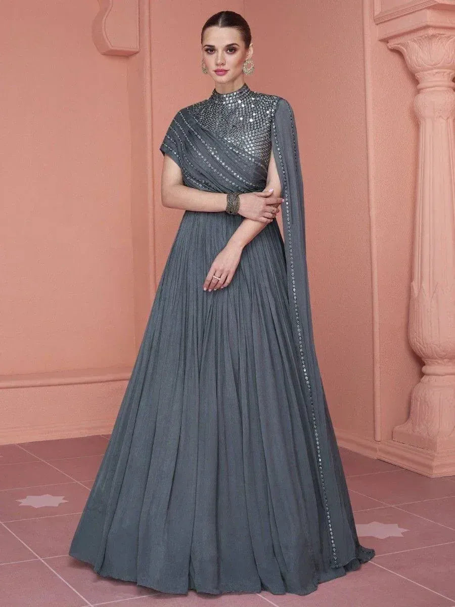 Woman wearing grey embellished Indian ethnic gown with sequin detailing and draped dupatta