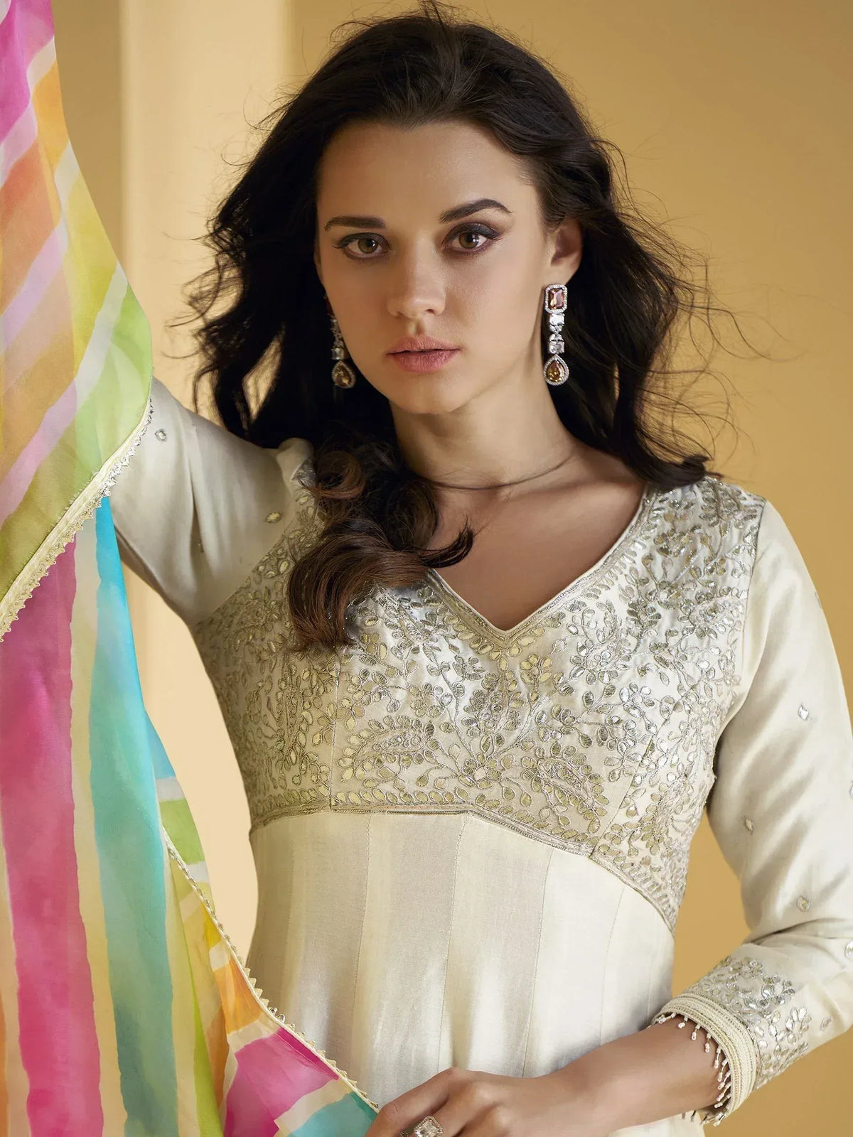 Elegant ivory embroidered salwar kameez with colorful dupatta, perfect for Indian ethnic wear occasions.