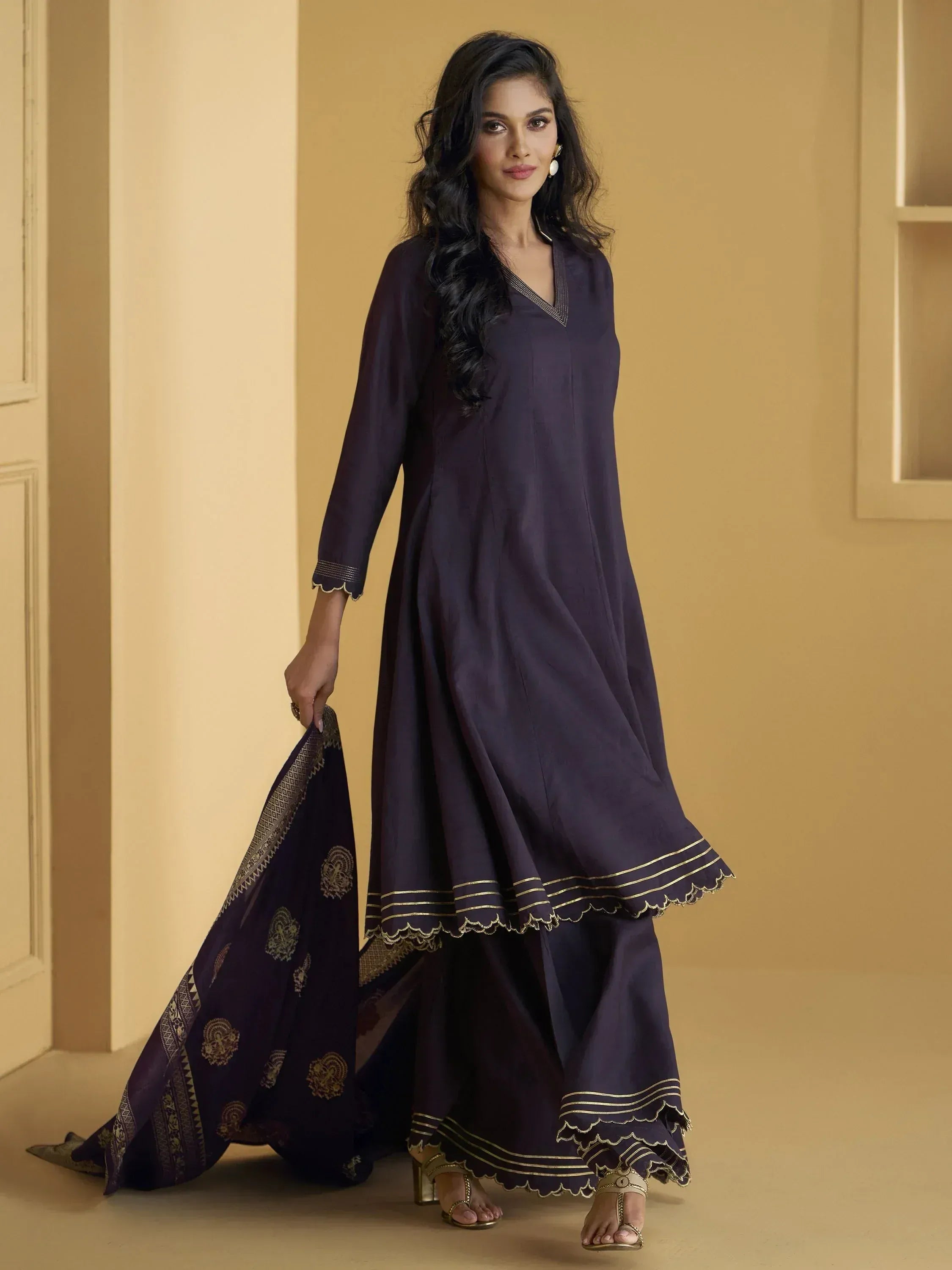 Elegant purple ethnic kurta with gold trim and matching printed dupatta for women
