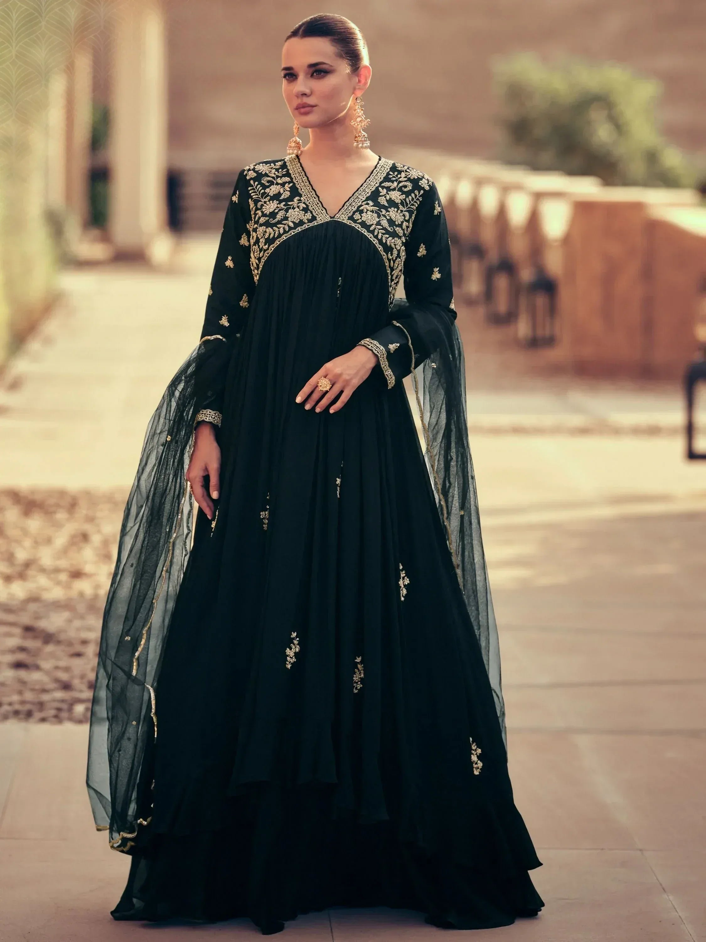 Black embroidered anarkali gown with gold detailing, perfect for Indian ethnic wear occasions.