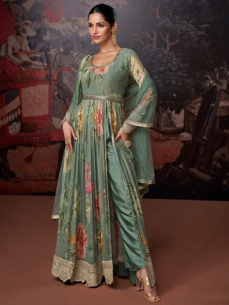 Green floral printed ethnic gown with embroidered detailing and palazzo pants, perfect for Indian occasions.
