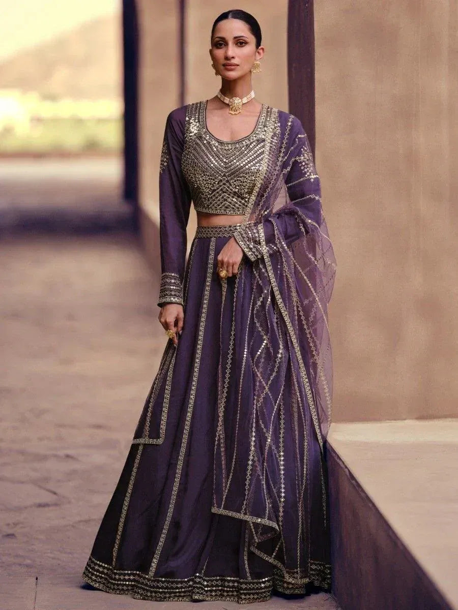 Purple designer lehenga choli with gold embroidery, perfect for Indian ethnic wear events