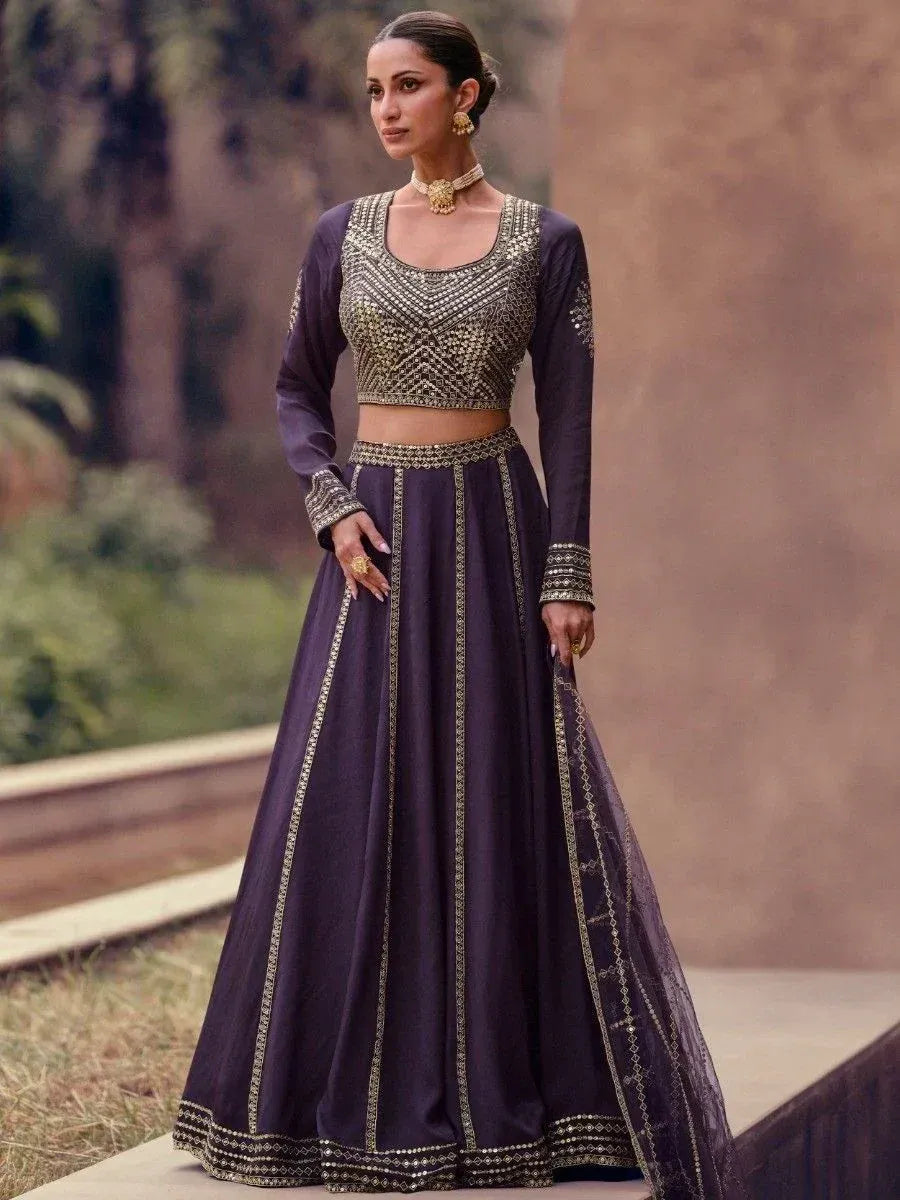 Elegant purple lehenga choli with gold embroidery, perfect for Indian ethnic wear and festive occasions.