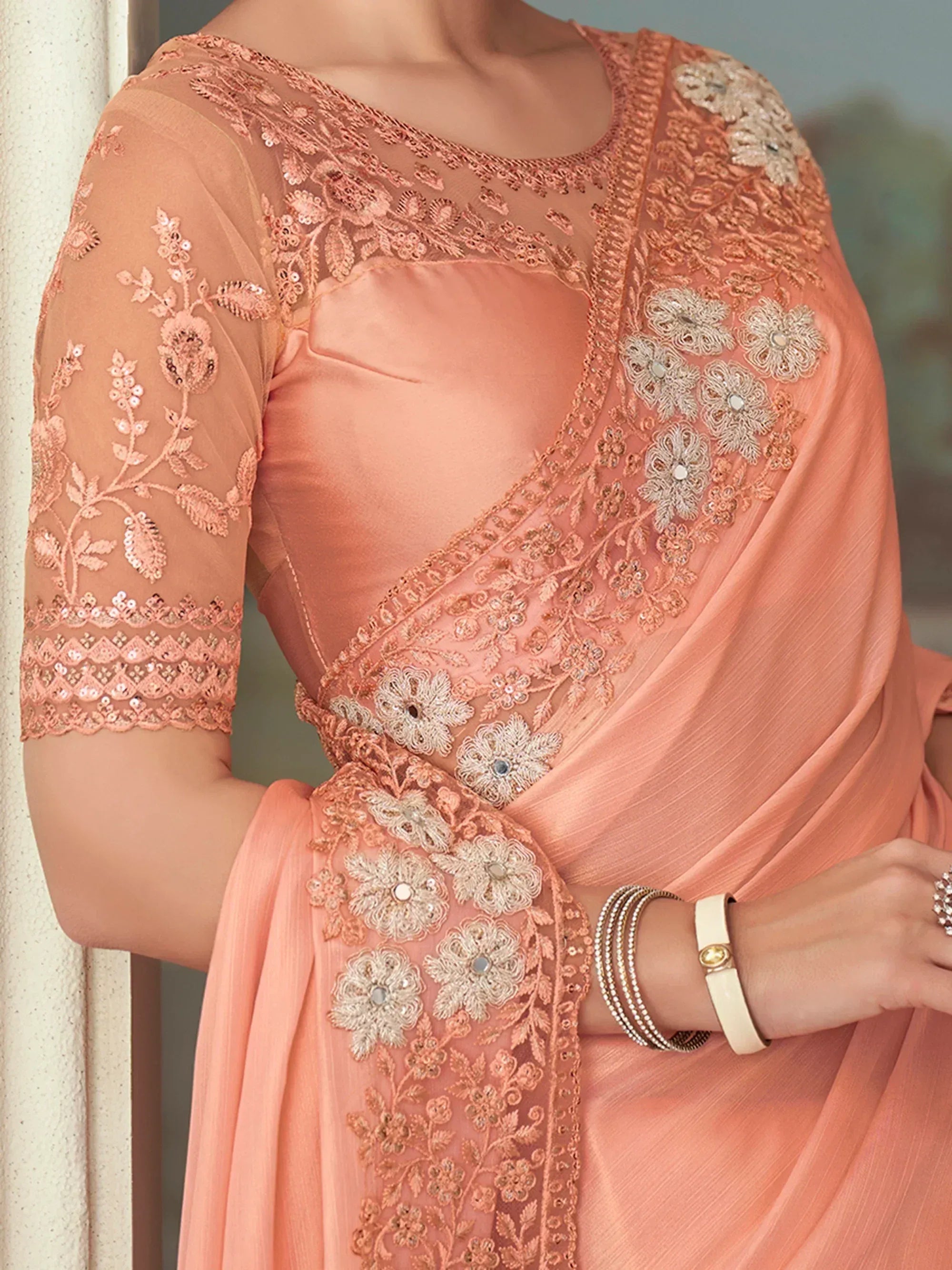 Peach designer saree with floral embroidery and sequin work, perfect for Indian ethnic occasions