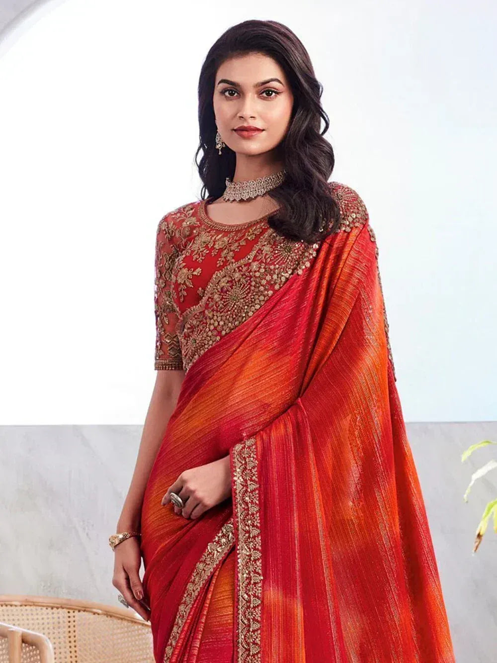 Red and orange designer saree with gold embroidery, perfect for Indian ethnic wear occasions