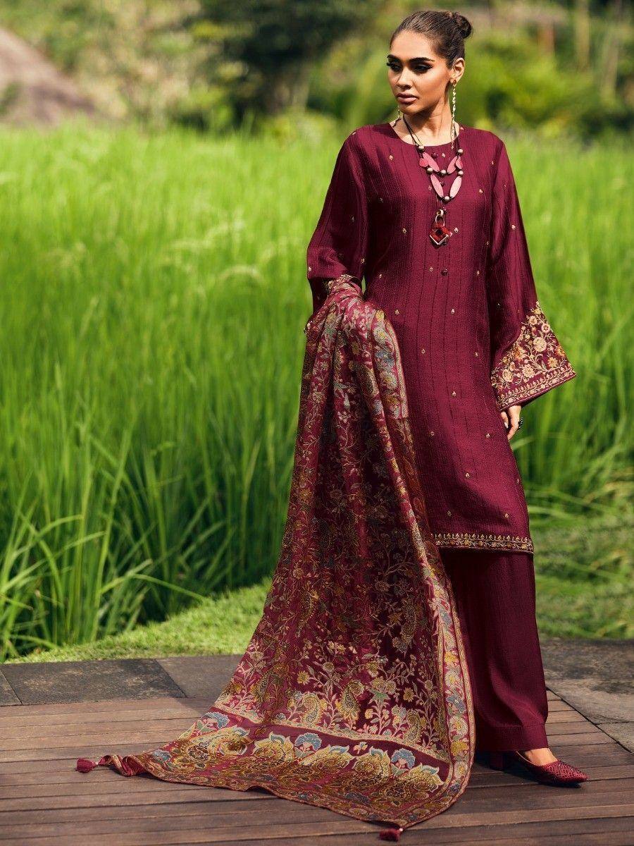 Maroon ethnic salwar kameez with floral dupatta, perfect for Indian festive occasions