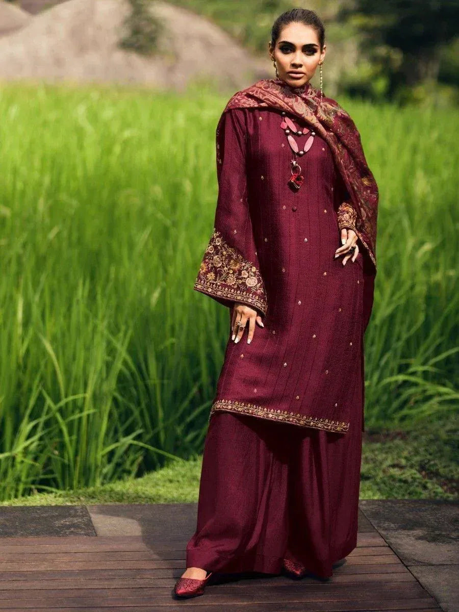 Maroon embroidered salwar kameez with dupatta, perfect for ethnic occasions and festive wear.