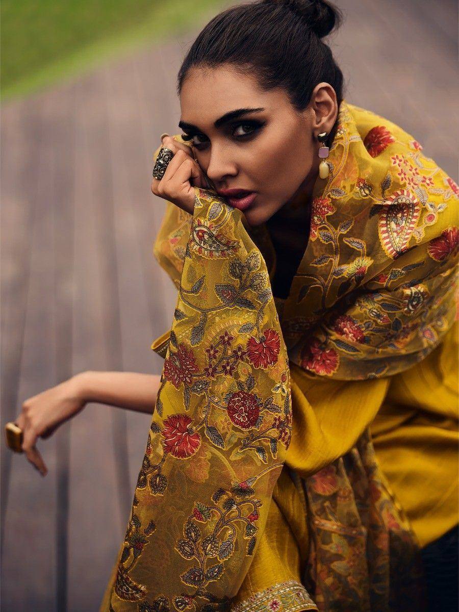Yellow floral embroidered dupatta with red motifs, styled with ethnic wear for festive occasions