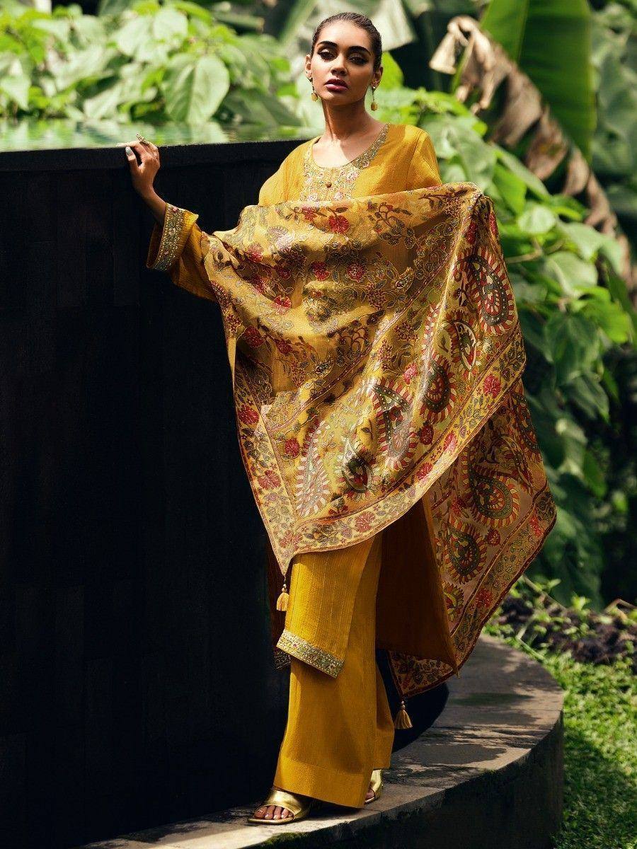Elegant mustard yellow salwar kameez with floral paisley dupatta, perfect for ethnic occasions