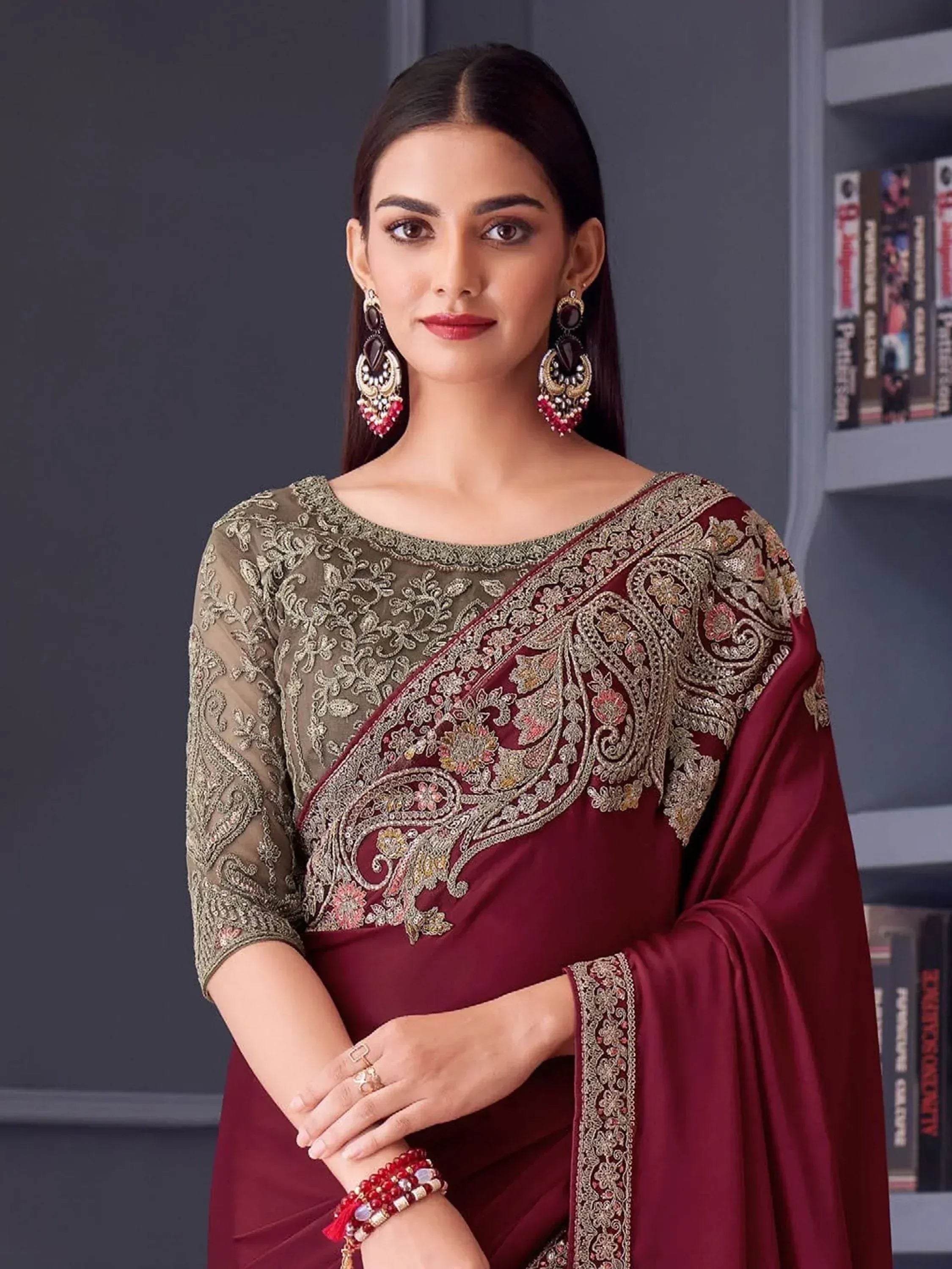 Maroon embroidered saree with gold detailing, perfect for Indian ethnic wear and festive occasions