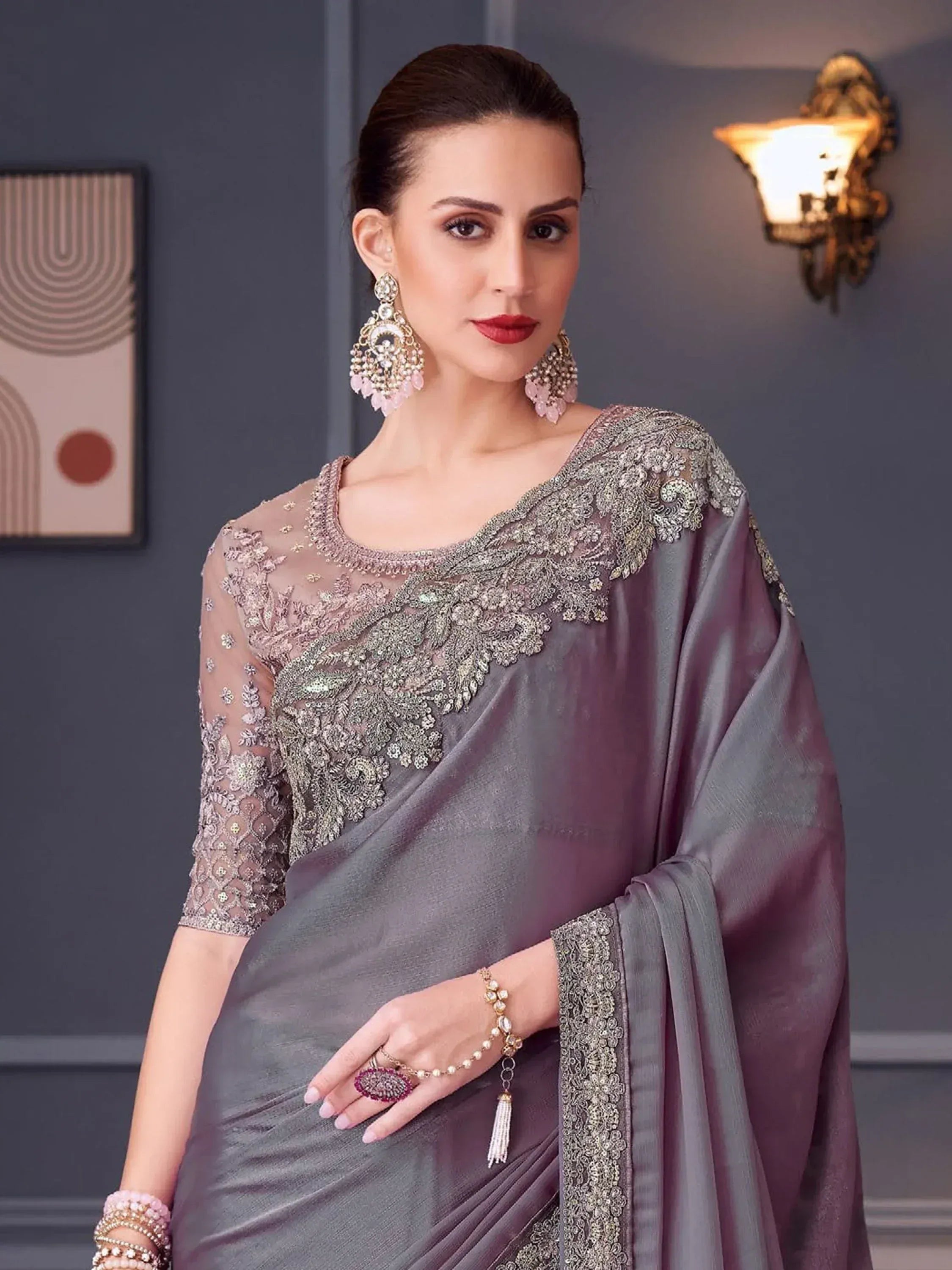 Elegant grey saree with heavy silver embroidery, perfect for Indian ethnic wear events