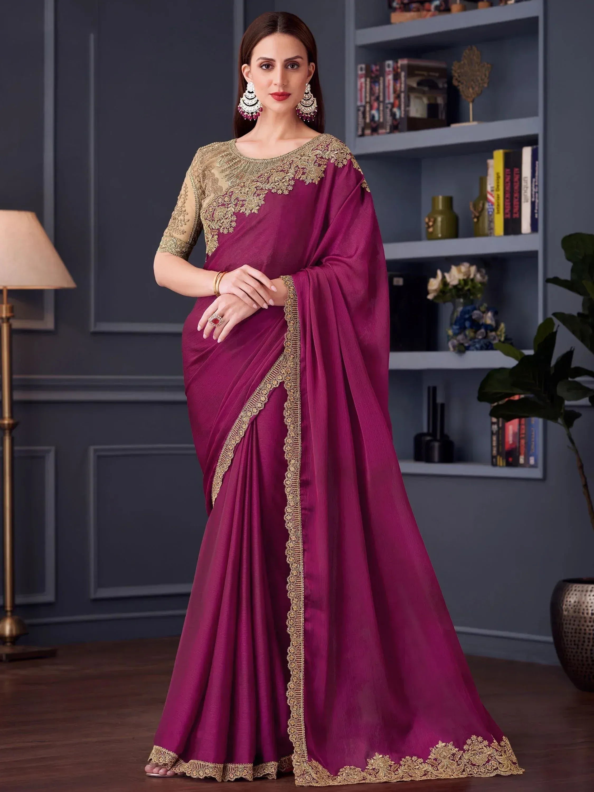 Elegant maroon saree with gold embroidery, perfect for Indian ethnic wear and festive occasions.