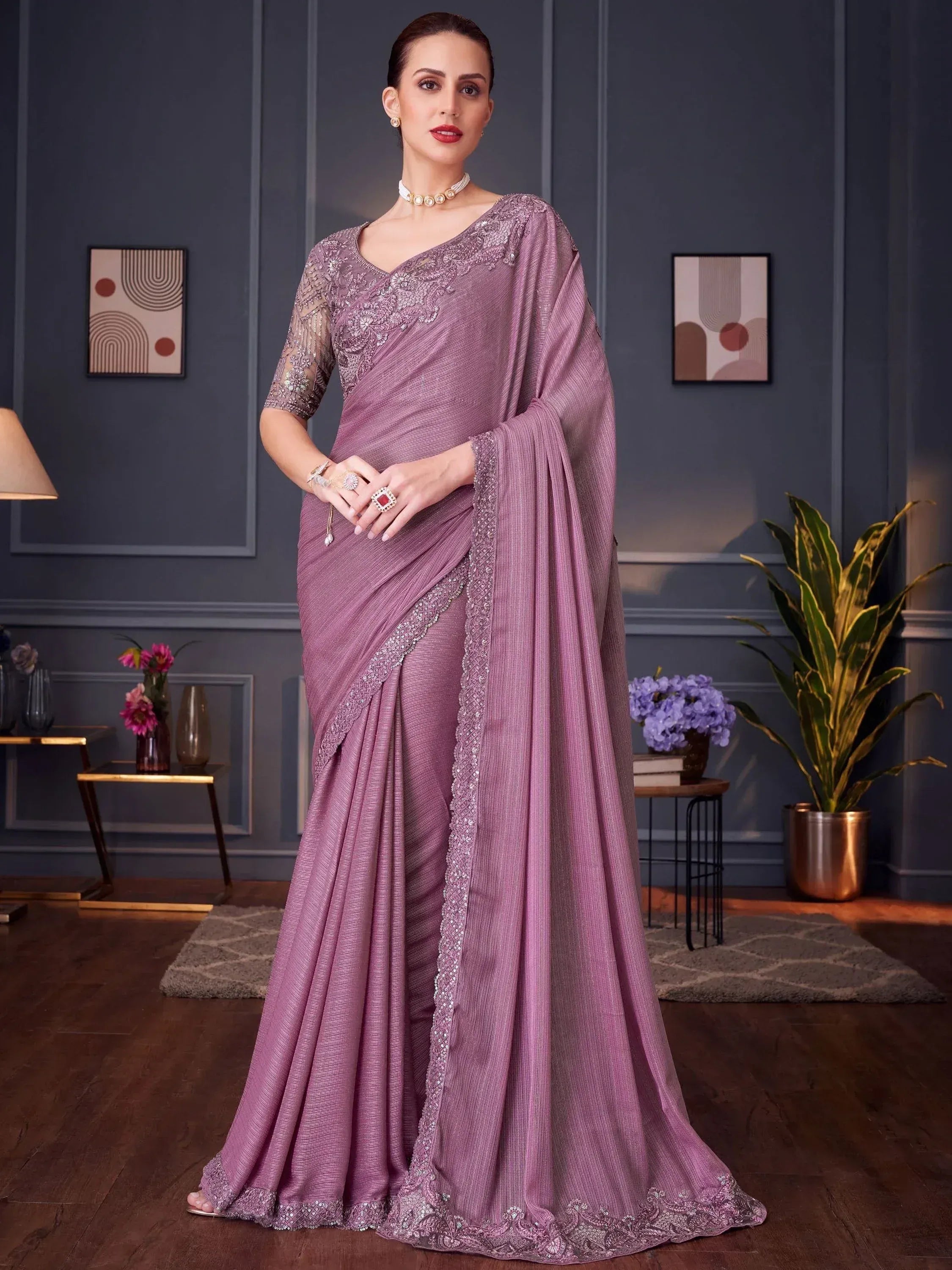 Elegant mauve designer saree with intricate embroidery and sequin detailing, perfect for Indian ethnic occasions
