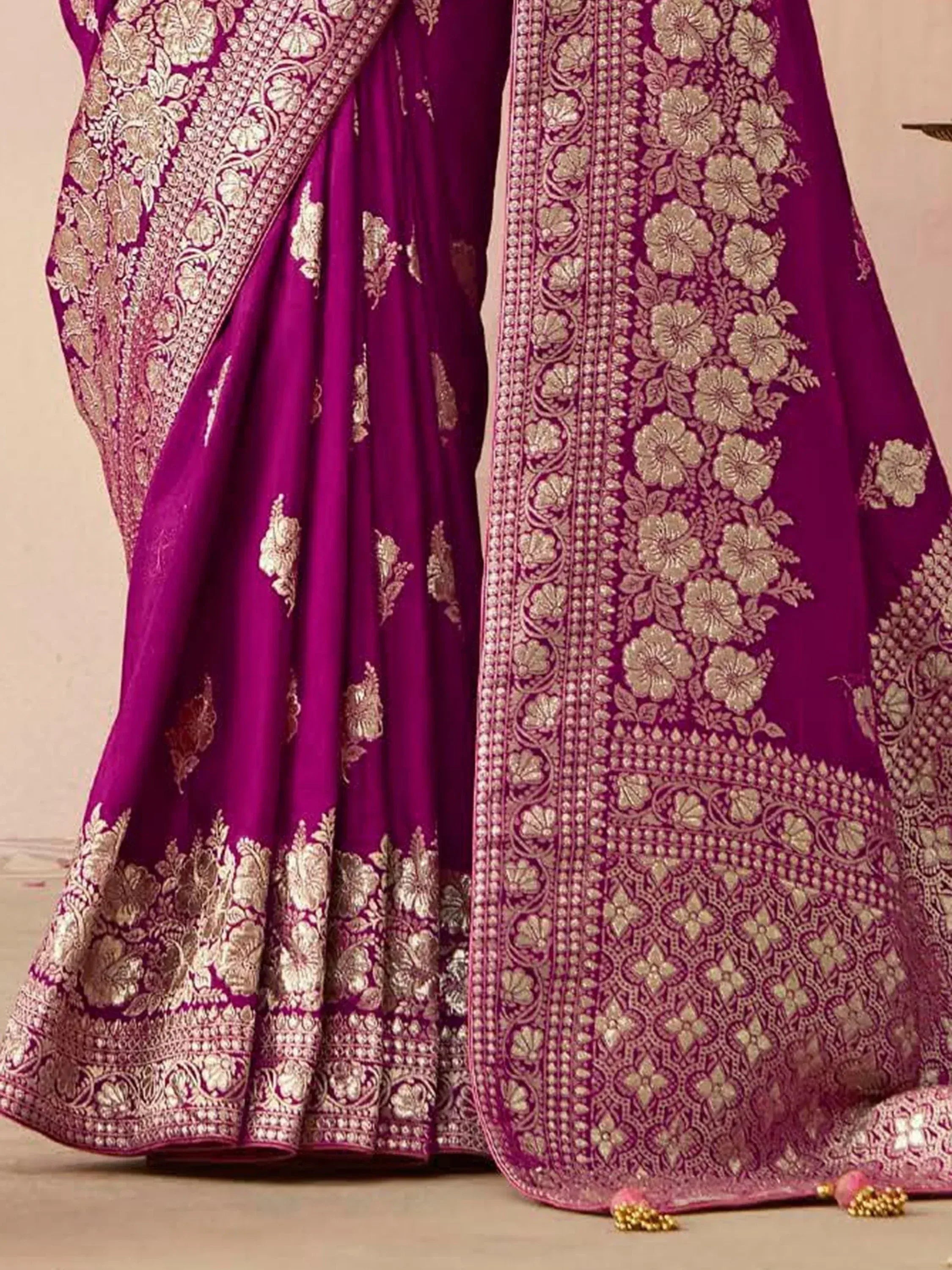 Purple designer lehenga choli with gold floral embroidery and detailed border work