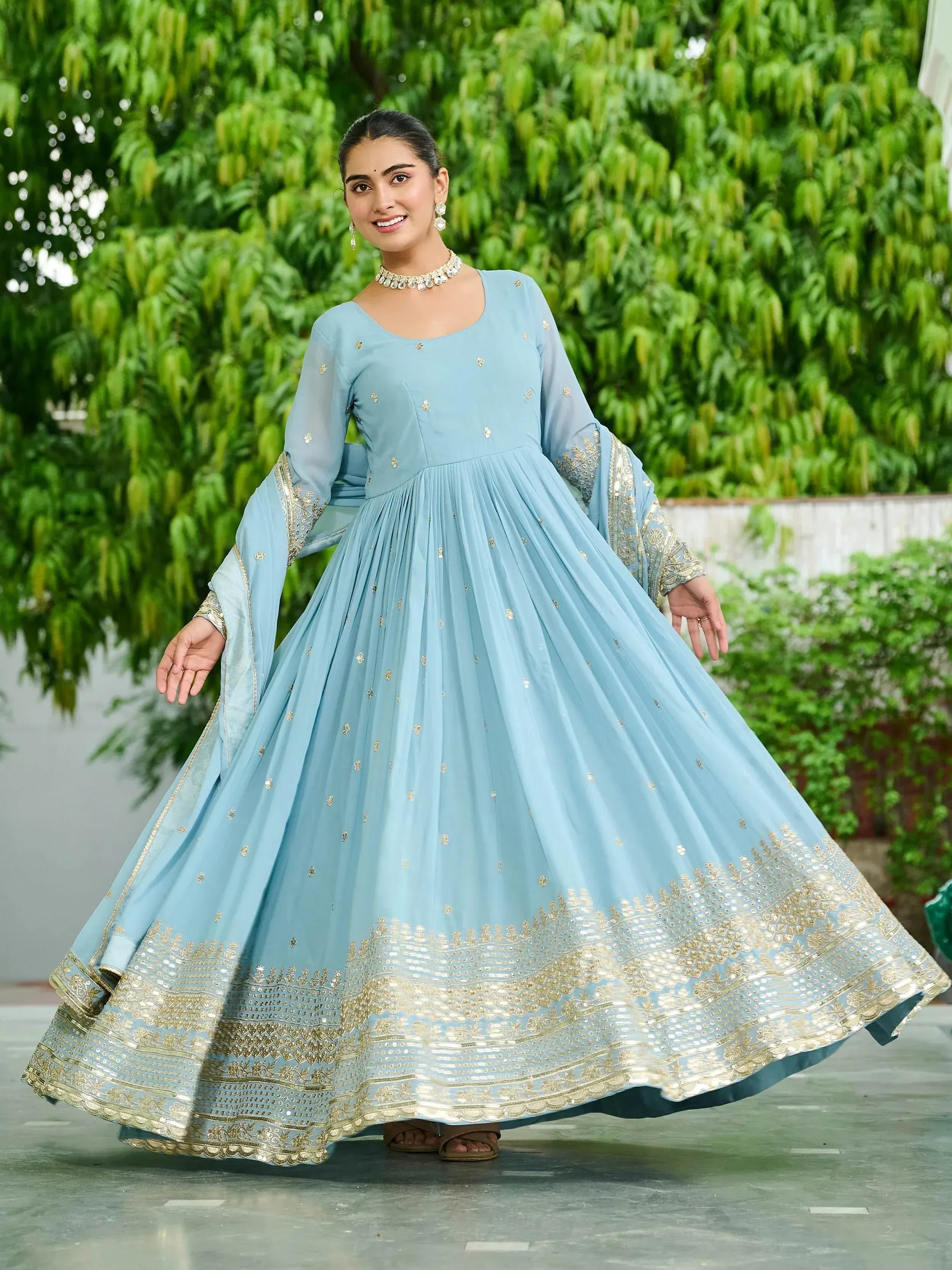 Light blue anarkali with gold embroidery, perfect for Indian ethnic wear occasions