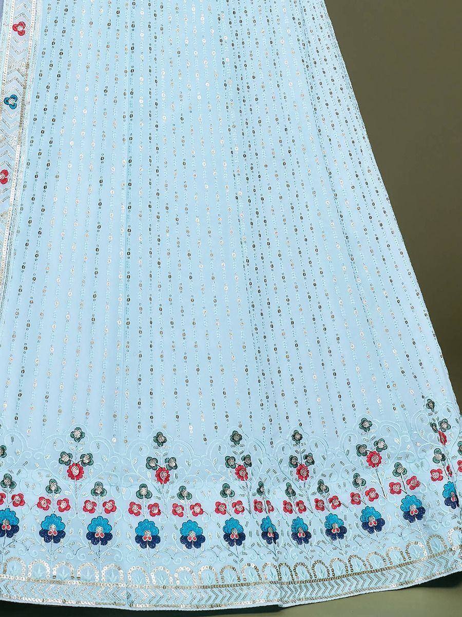 Light blue ethnic lehenga with floral embroidery and sequin detailing, perfect for Indian weddings or festive occasions.