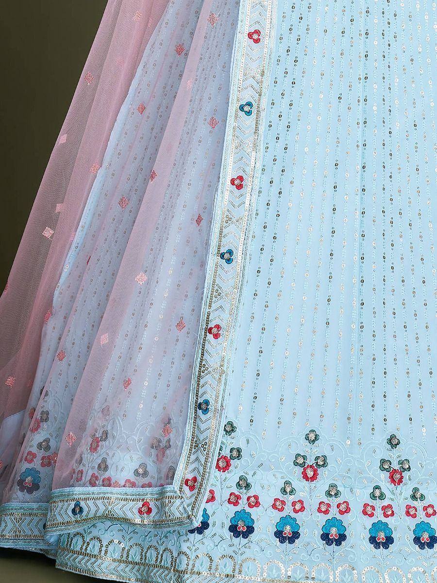Light blue designer lehenga with floral embroidery and pink net dupatta, perfect for Indian ethnic wear