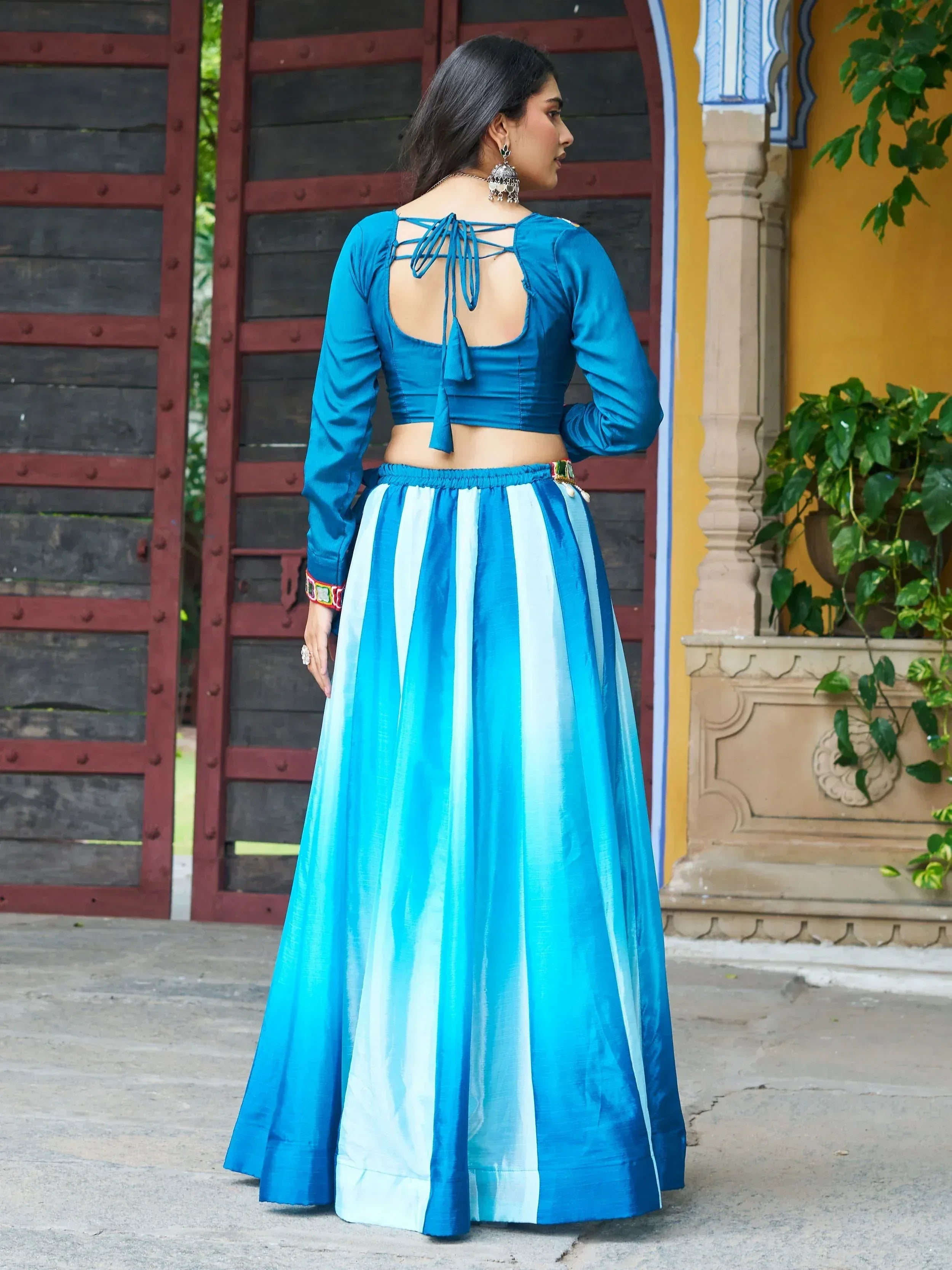 Blue and white striped ethnic lehenga with back-tie blouse, perfect for Indian festivals and weddings.