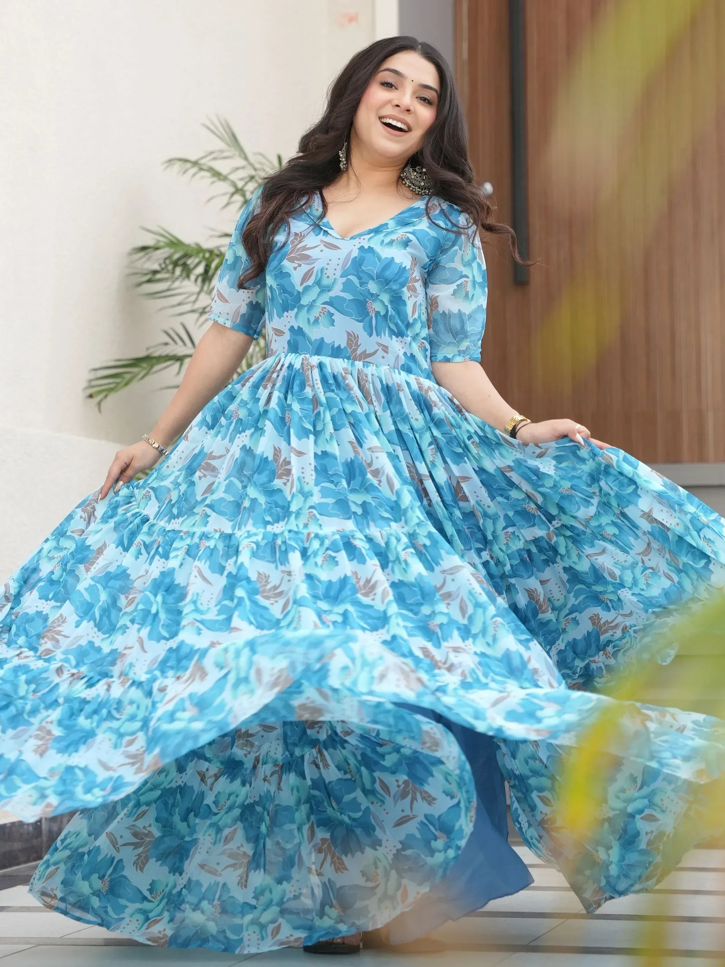 Blue floral ethnic gown with flared skirt, perfect for festive occasions and parties