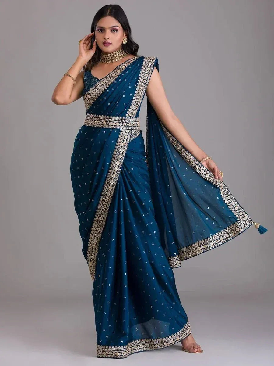 Elegant teal saree with gold embroidery, perfect for Indian ethnic wear occasions