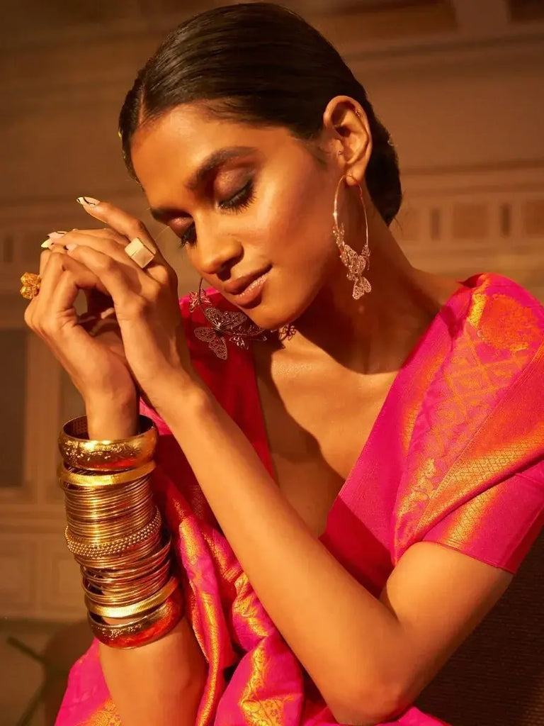 Glamorous Hot Pink Zari weaving Silk Reception Wear Saree