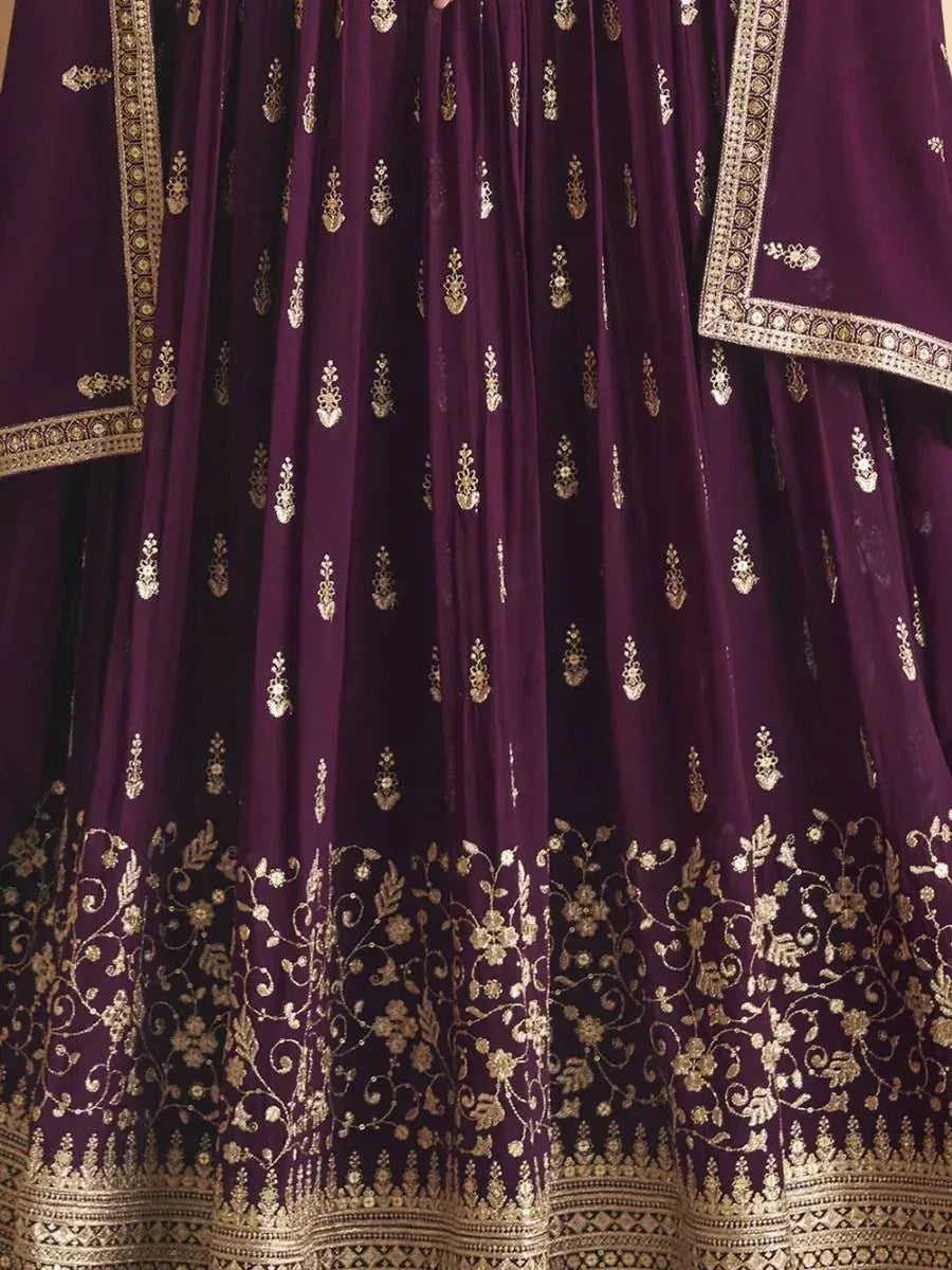 Purple lehenga choli with gold floral embroidery and detailed border work