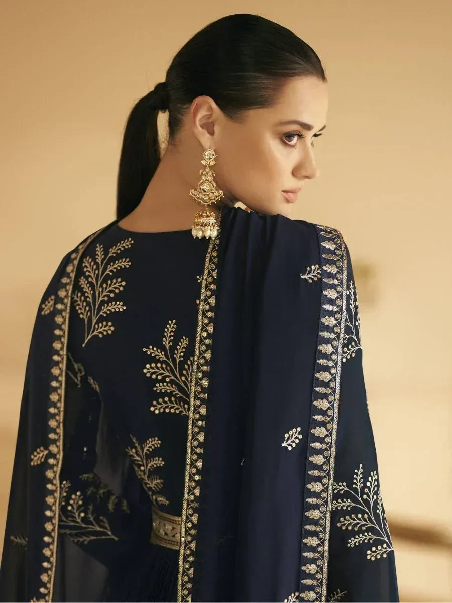 Navy blue embroidered salwar kameez with gold leaf motifs and jhumka earrings, ethnic Indian wear