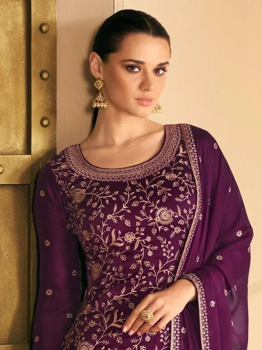 Purple embroidered salwar kameez with gold floral detailing, perfect for Indian ethnic wear occasions