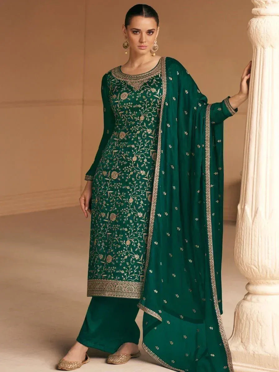 Emerald green embroidered salwar kameez with gold floral work and matching dupatta, perfect for Indian ethnic wear.