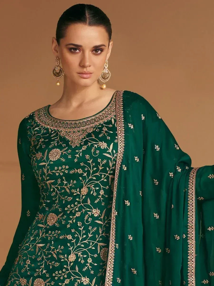 Emerald green embroidered salwar kameez with gold floral work and matching dupatta