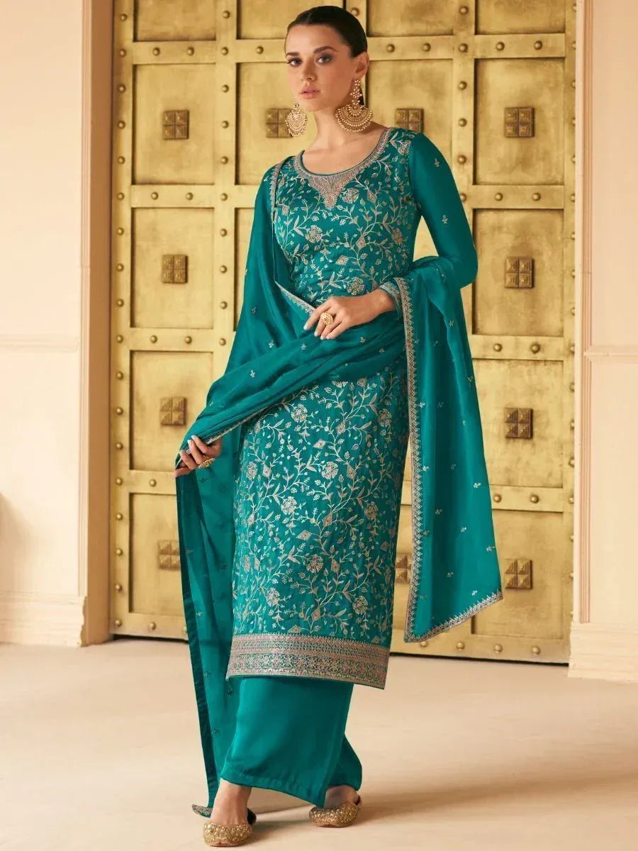 Teal embroidered salwar kameez with floral zari work, perfect for Indian ethnic wear occasions