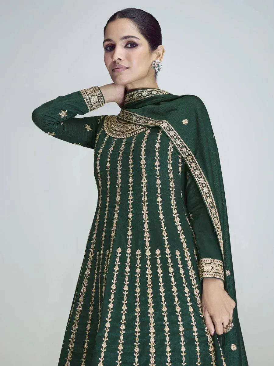 Emerald green ethnic anarkali with gold embroidery, perfect for Indian weddings and festive occasions