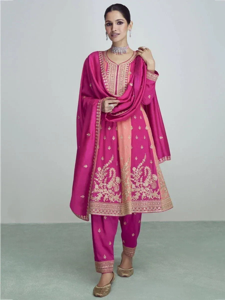 Pink embroidered salwar kameez with gold detailing, perfect for festive occasions and ethnic wear